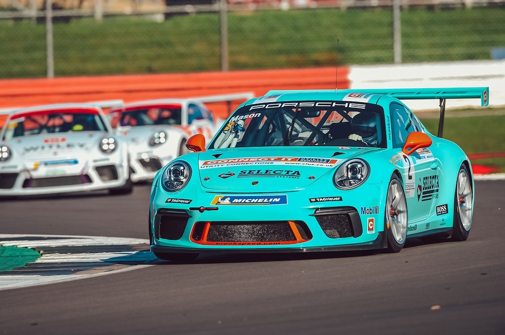 Image of Porsche GT4 Cayman on track in Silverstone, UK